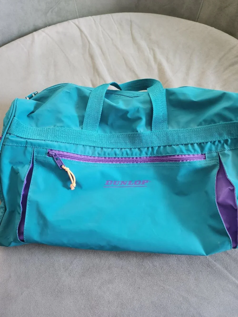 Vintage style Dunlop sports duffel bag in retro teal and purple color